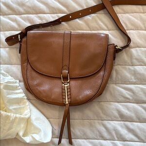 Elegant Tan Leather Covet Crossbody Bag